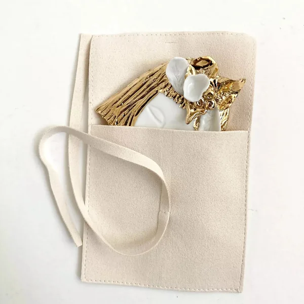 Broche Visage d'or