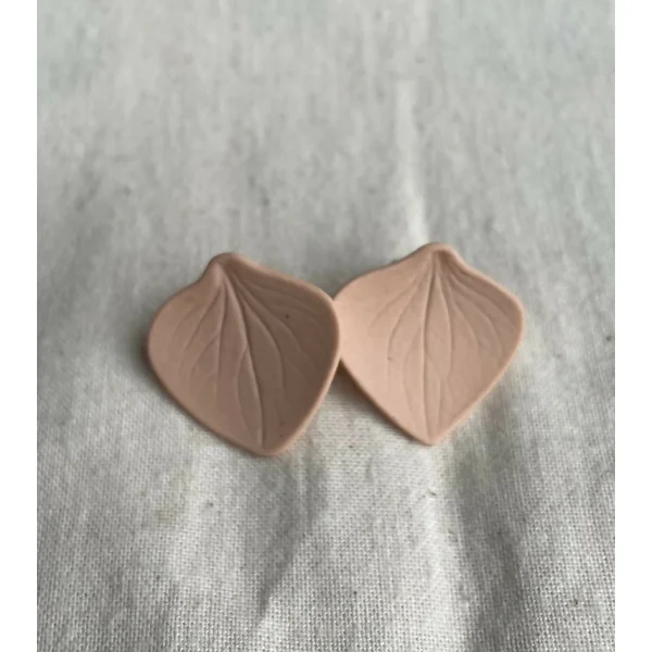 Clous d'oreille en porcelaine colorée