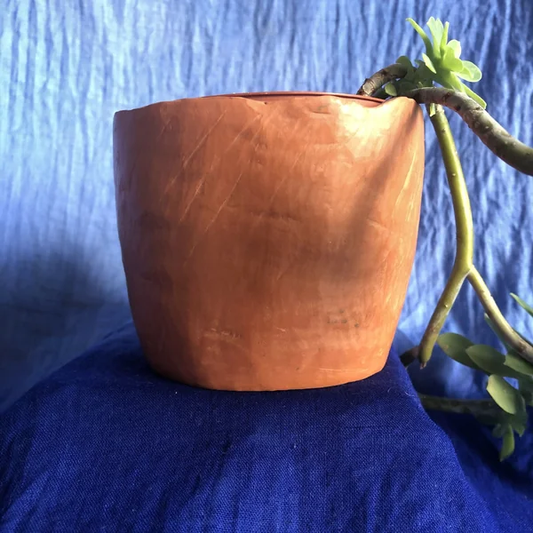 Pot rouge griffé