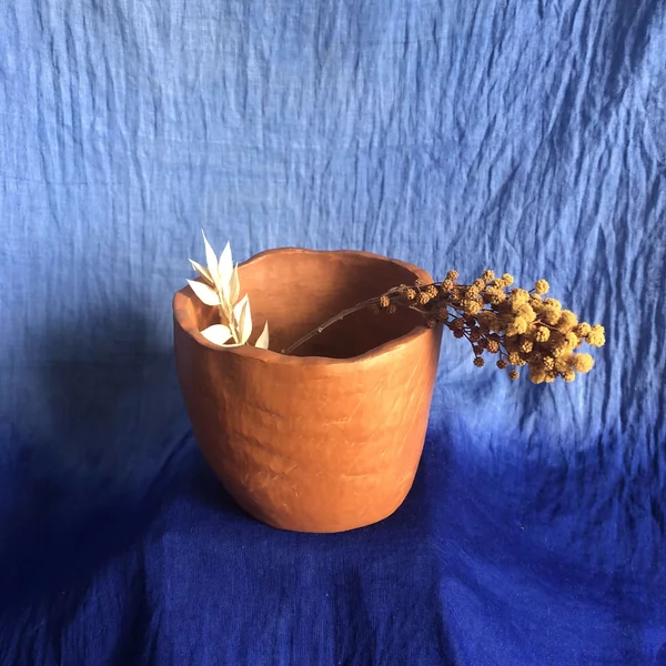 Pot rouge griffé