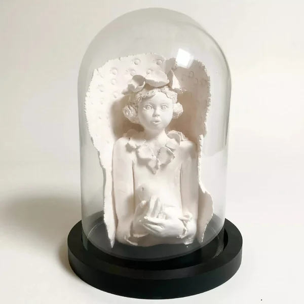 Sculpture Dame à l'oiseau